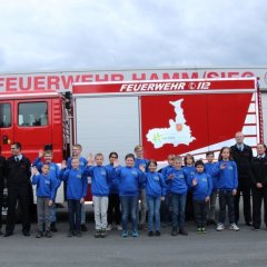 Gruppenfoto der Beförderten Wehrleute mit Bürgermeister Dietmar Henrich